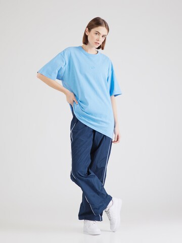 Loosefit Pantalon Nike Sportswear en bleu