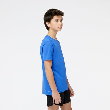 new balance - Camiseta funcional 'Accelerate' en azul