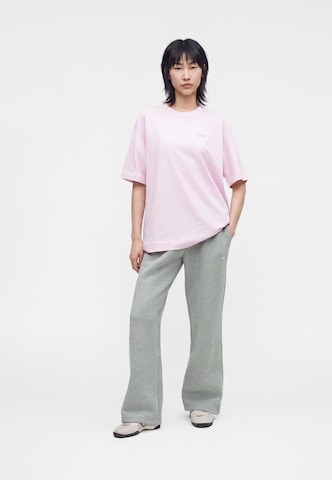 Nike Sportswear Lużny krój Spodnie 'STDO FLC' w kolorze szary