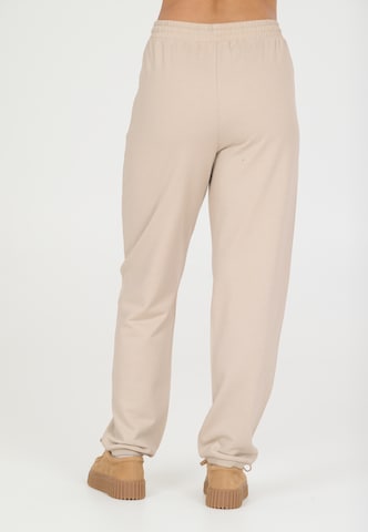 NOU Loose fit Workout Pants 'Vacay' in Beige