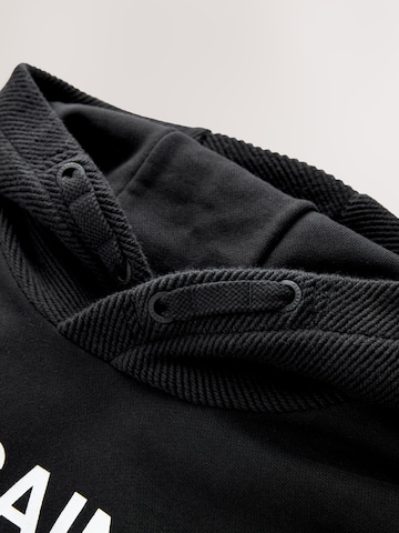 smALLSAINTS - Sweatshirt em preto