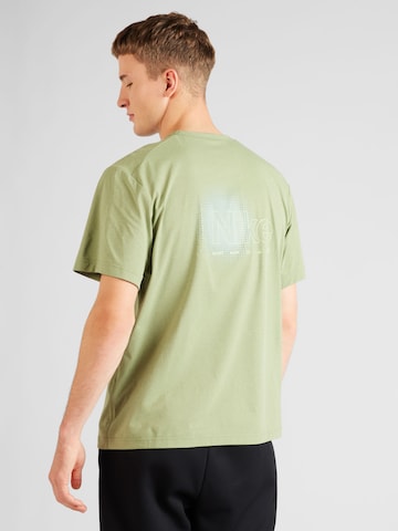 NIKE - Camisa funcionais 'HYVERSE' em verde: frente
