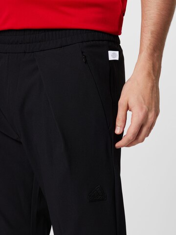 Slimfit Pantaloni sport 'City Escape' de la ADIDAS SPORTSWEAR pe negru