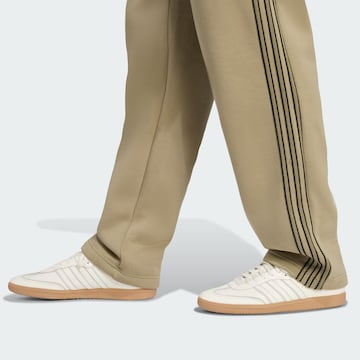 ADIDAS ORIGINALS Loose fit Trousers in Green