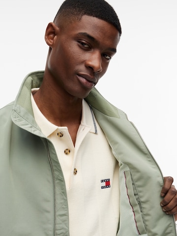 Tommy Jeans Tussenjas 'ESSENTIAL' in Groen