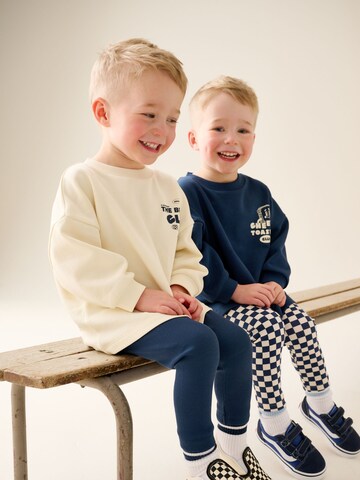 Set Next en bleu