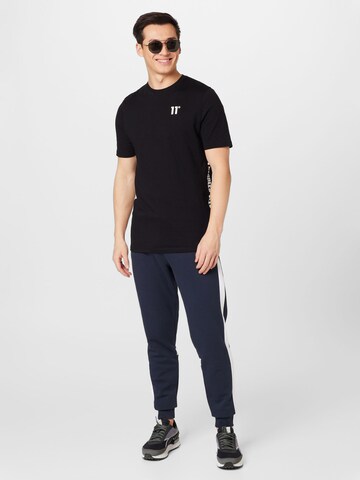 11 Degrees T-shirt i svart