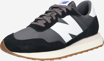 Scarpa sportiva '237' di new balance in nero: frontale