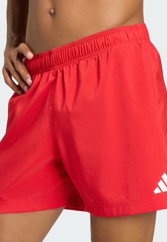 ADIDAS SPORTSWEAR - Calções de banho desportivos 'ESS' em vermelho