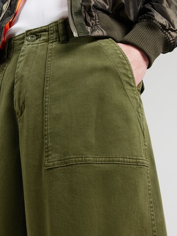 ALPHA INDUSTRIES Loosefit Kalhoty 'Fatigue 1971 HERITAGE' – zelená