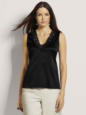 MADELEINE Top in Zwart: voorkant