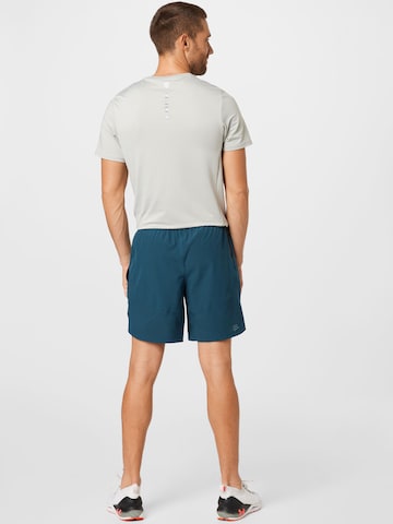 UNDER ARMOUR Regular Sportbroek in Blauw