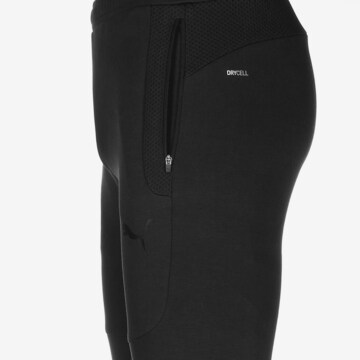 Skinny Pantaloni sportivi di PUMA in nero