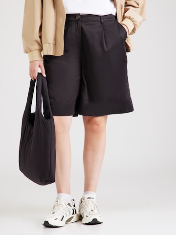 Loosefit Pantaloni con pieghe 'CARMANITA' di ONLY Carmakoma in nero: frontale