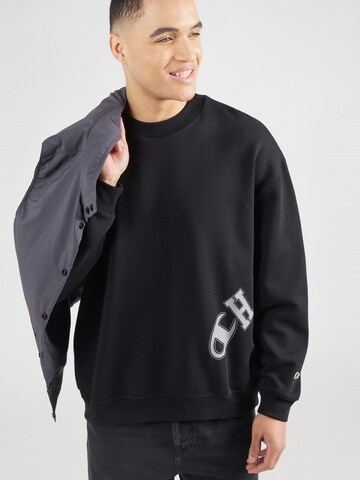 Champion Authentic Athletic Apparel - Sudadera en negro: frente