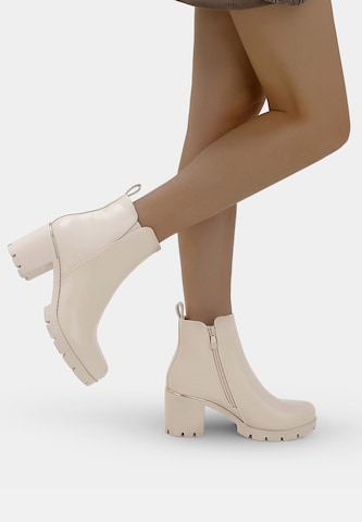 Elara Ankle Boots in Beige