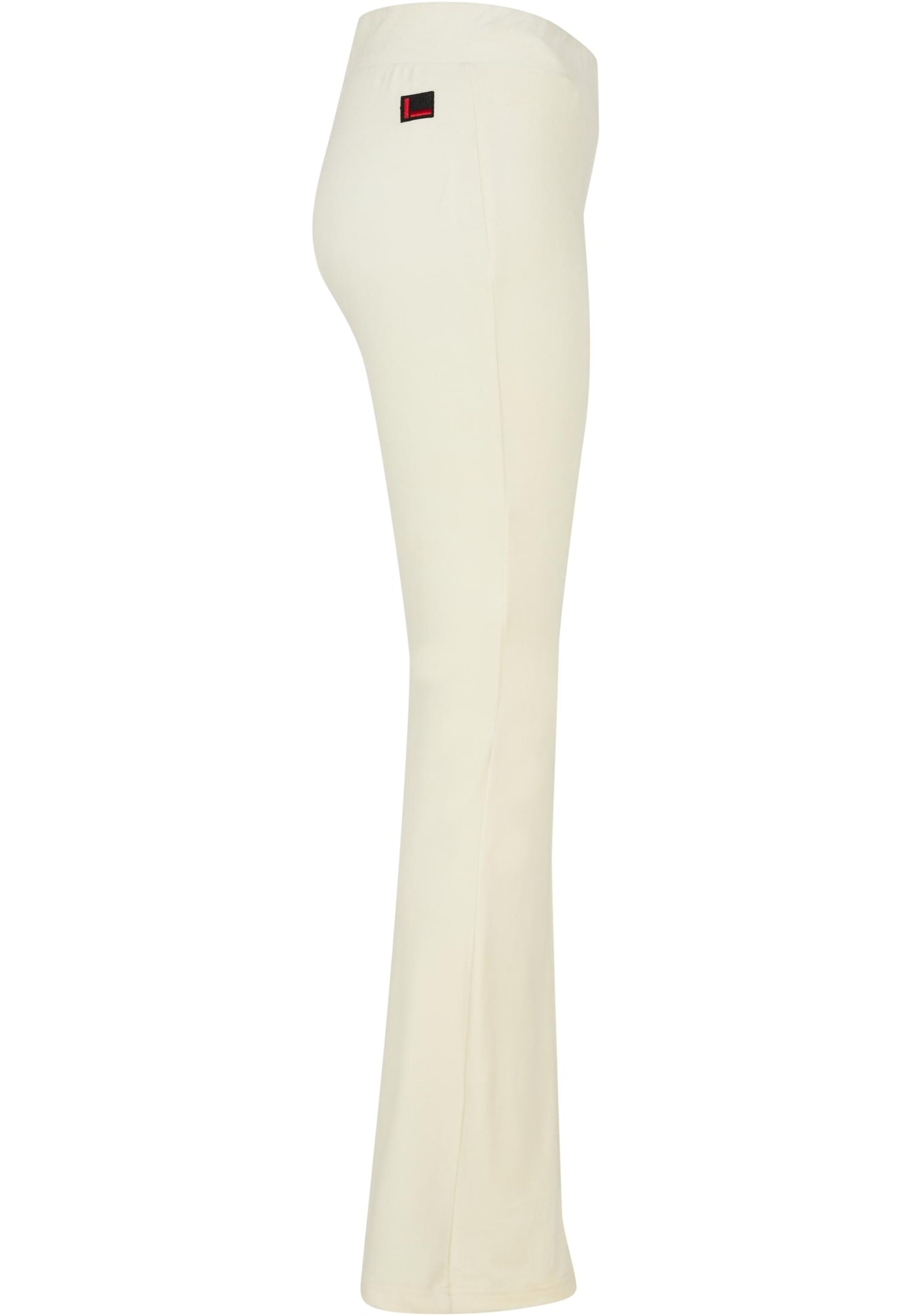 regular Pantaloni di FUBU in giallo