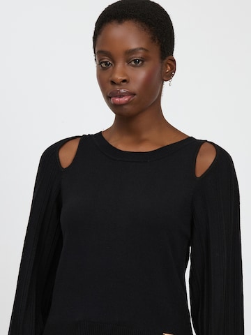 Influencer Sweter w kolorze czarny