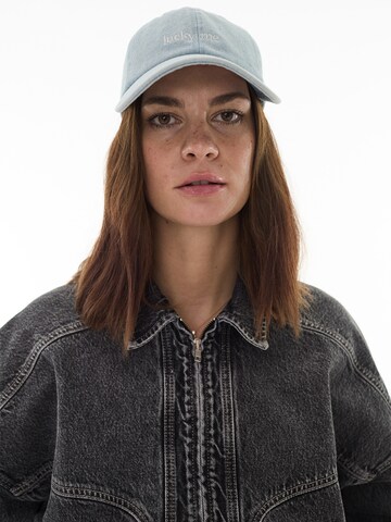 ABOUT YOU x Laura Giurcanu Cap 'Katrin' in Blue: front