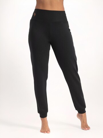 Urban Goddess Yoga & Activewear Loose fit Workout Pants 'Ojas Yogabroek - Onyx Black' in Black: front