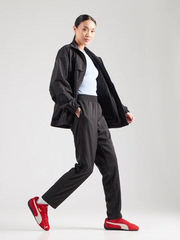 PUMAregular Sportske hlače 'ESS' - crna boja