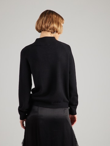 monari Kampsun, värv must