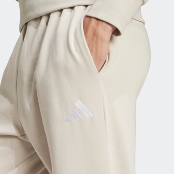 ADIDAS SPORTSWEAR Конический (Tapered) Спортивные штаны 'Feelcozy' в Бежевый