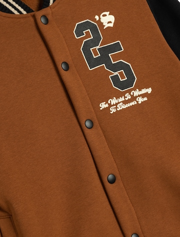 Koton Tussenjas in Bruin