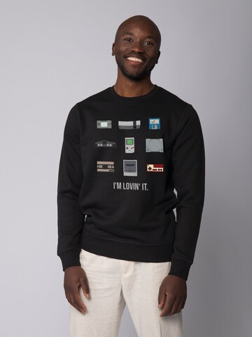 Felpa ' Videogames ' di Watapparel in nero: frontale