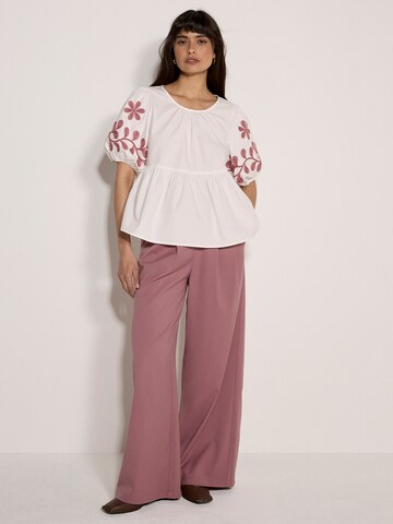Apricot Floral Embroidered Peplum Top ' ' in Beige