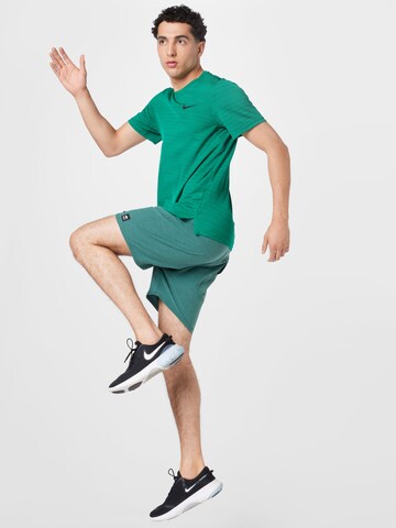 NIKE Λειτουργικό μπλουζάκι 'Superset' σε πράσινο