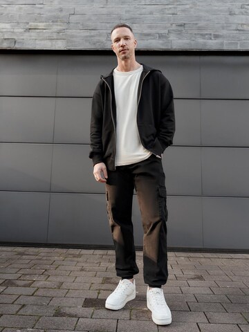 Veste de survêtement 'Essential' DAN FOX APPAREL en noir