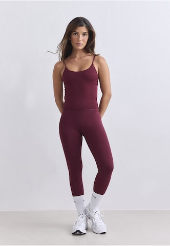 Skinny Pantaloni sportivi 'Sense' di Aim'n in rosso: frontale