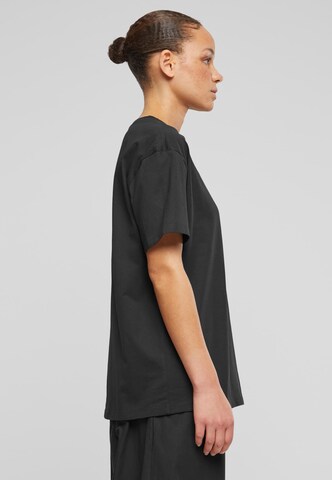 Karl Kani T-Shirt 'Essential' in Schwarz