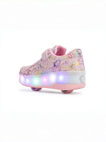 HUSKSWARE Inline and Roller Skates in Pink