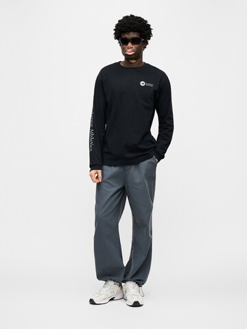 new balance T-shirt i svart