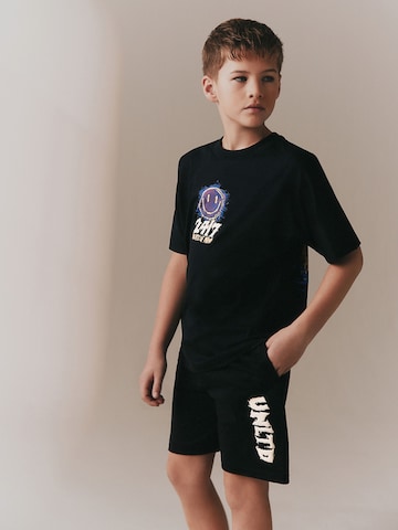 Next Setti värissä musta