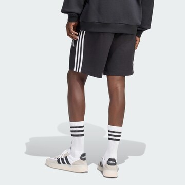 Loosefit Pantaloni sportivi 'ESSENTIALS' di ADIDAS SPORTSWEAR in nero