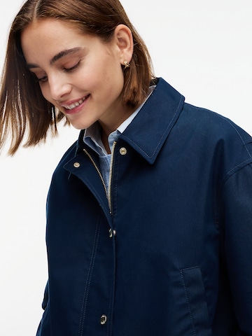 TOMMY HILFIGER Tussenjas in Blauw