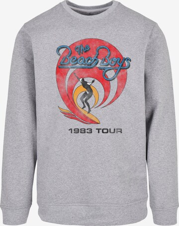 F4NT4STIC Sweatshirt 'The Beach Boys Band Surfer '83 Vintage' in Grijs: voorkant