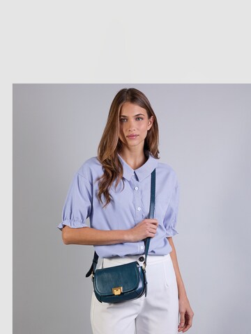 The Bridge Crossbody Bag in Blue: front