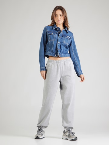 Tapered Pantaloni di Calvin Klein Jeans in grigio