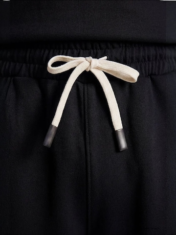 Completo per l'allenamento di Tommy Life in nero