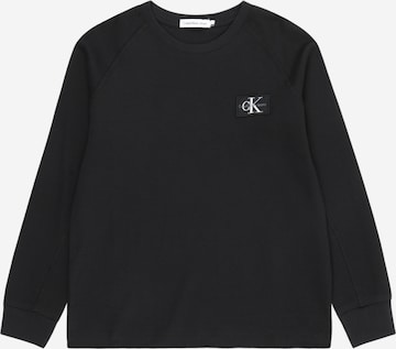 T-Shirt Calvin Klein Jeans en noir : devant