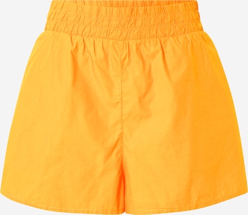 Monki - Regular Calças em laranja: frente