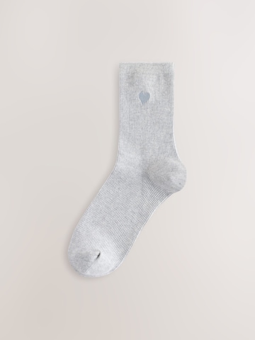 Next Sockor i grå