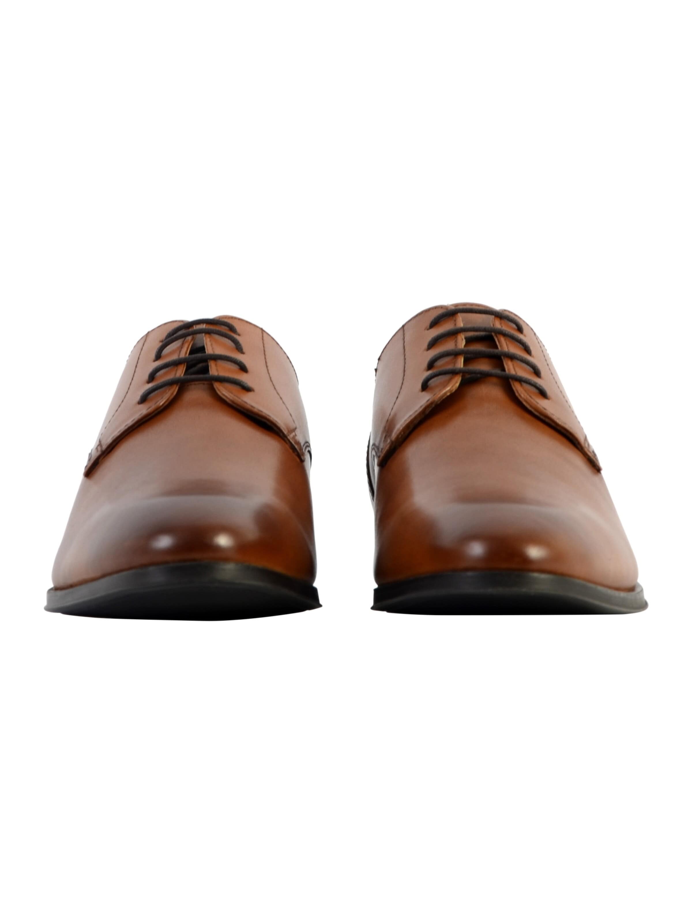 Chaussure basse REDSKINS en marron