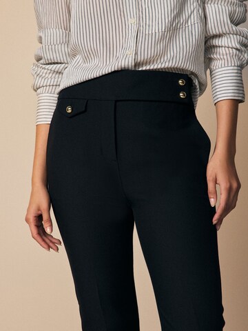 Next Slimfit Kalhoty s puky – černá