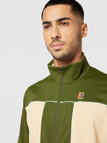 NIKE Trainingsjacke in Grün