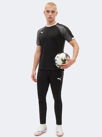 Coupe slim Pantalon de sport 'TeamLIGA26' PUMA en noir